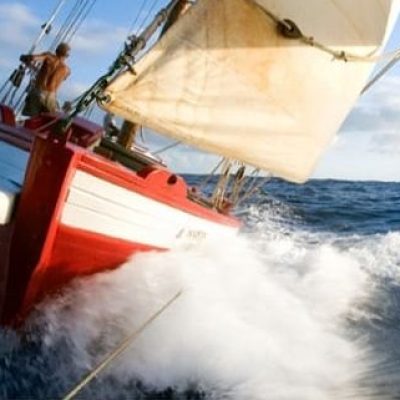 a small boat in a body of water