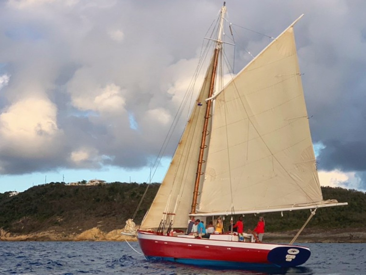 a small boat in a large body of water