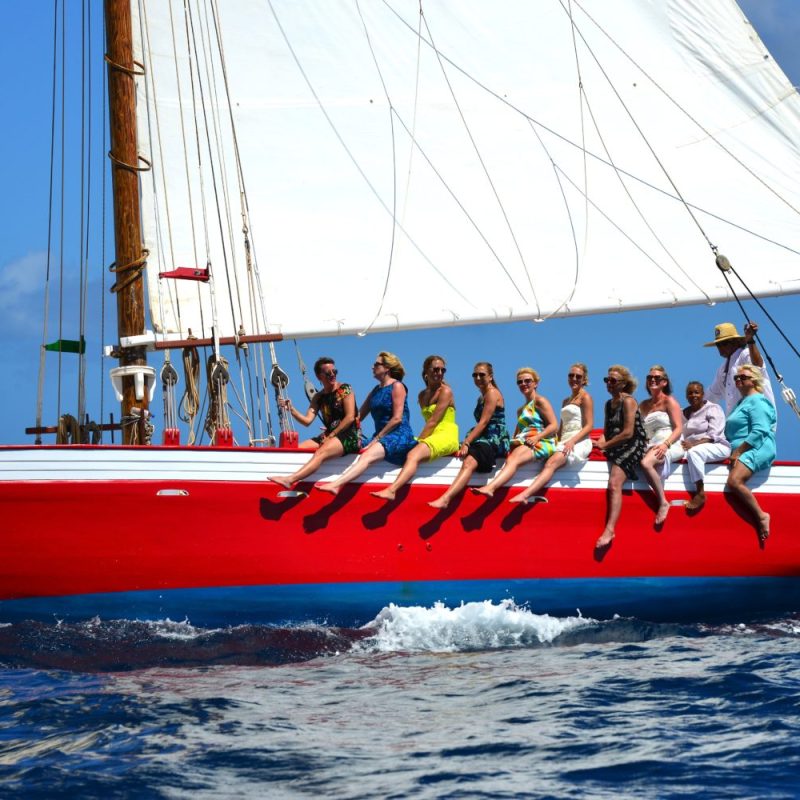 a group of people on a boat in the water